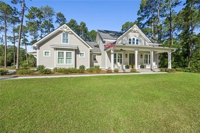 Welcome to refined coastal living in the highly sought-after - photo 2