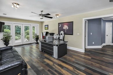 Nestled among nearly two acres of mature old-growth hardwoods in - photo 43