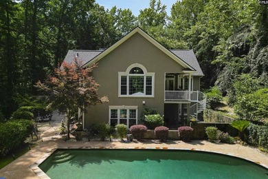 Nestled among nearly two acres of mature old-growth hardwoods in - photo 45
