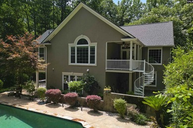Nestled among nearly two acres of mature old-growth hardwoods in - photo 46