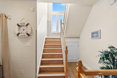 This upscale 3-story townhome has a wonderful water view of