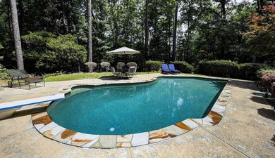 Nestled among nearly two acres of mature old-growth hardwoods in - photo 48