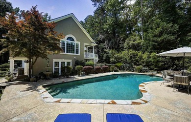 Nestled among nearly two acres of mature old-growth hardwoods in - photo 49