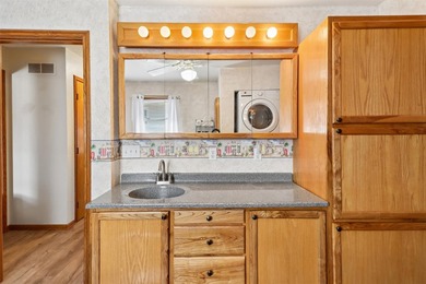 Situated on a .26-acre corner lot with mature surroundings, this