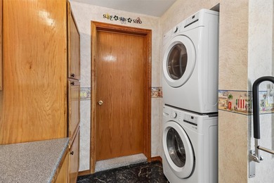 Situated on a .26-acre corner lot with mature surroundings, this