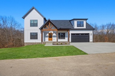 Indulge in 4789 square feet of refined lakefront living, where - photo 1