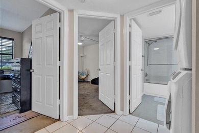 Location is everything! This 3-bedroom, 2-bath condo in Windwood - photo 12