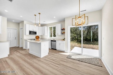 PRICE IMPROVEMENT! Last Home Available! One of three new homes - photo 3