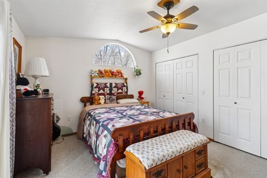 Situated on a .26-acre corner lot with mature surroundings, this