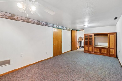 Situated on a .26-acre corner lot with mature surroundings, this