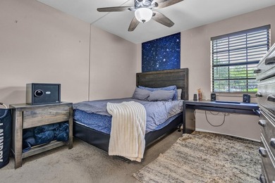 Location is everything! This 3-bedroom, 2-bath condo in Windwood - photo 17