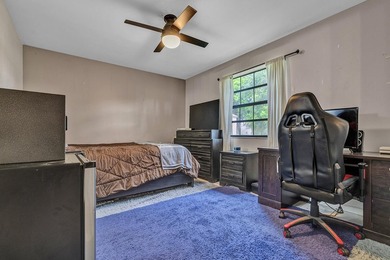 Location is everything! This 3-bedroom, 2-bath condo in Windwood - photo 18