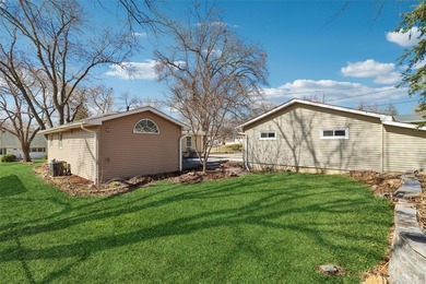 Situated on a .26-acre corner lot with mature surroundings, this