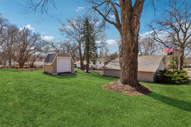 Situated on a .26-acre corner lot with mature surroundings, this