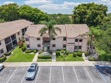 Location is everything! This 3-bedroom, 2-bath condo in Windwood - photo 23