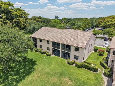 Location is everything! This 3-bedroom, 2-bath condo in Windwood - photo 27