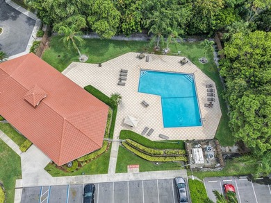 Location is everything! This 3-bedroom, 2-bath condo in Windwood - photo 31