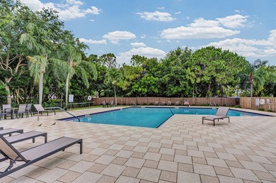 Location is everything! This 3-bedroom, 2-bath condo in Windwood - photo 32