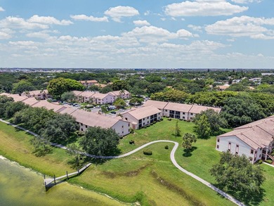 Location is everything! This 3-bedroom, 2-bath condo in Windwood - photo 45
