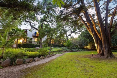 Perched atop a knoll in one of Montecito's most coveted - photo 7