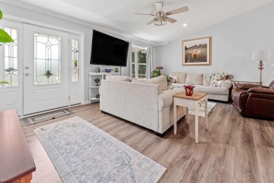 Tucked away on a private road, this gorgeous home offers the