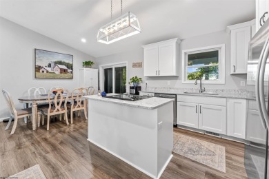 Tucked away on a private road, this gorgeous home offers the