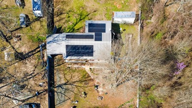 Located in Pine Harbor near Lake O' the Pines, this single-story - photo 2