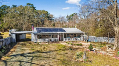 Located in Pine Harbor near Lake O' the Pines, this single-story - photo 6