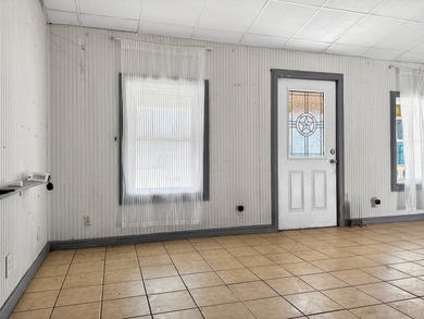 Located in Pine Harbor near Lake O' the Pines, this single-story - photo 7