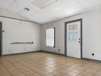 Located in Pine Harbor near Lake O' the Pines, this single-story - photo 9