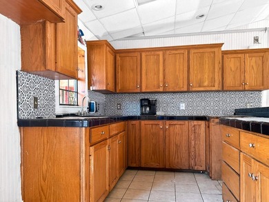 Located in Pine Harbor near Lake O' the Pines, this single-story - photo 10
