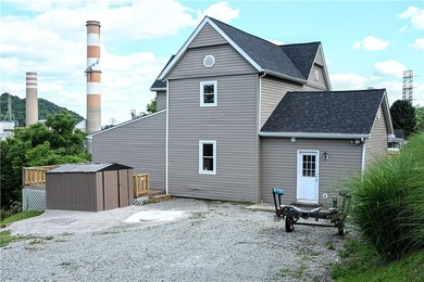 Enjoy peaceful river views from this move-in ready two-story - photo 1