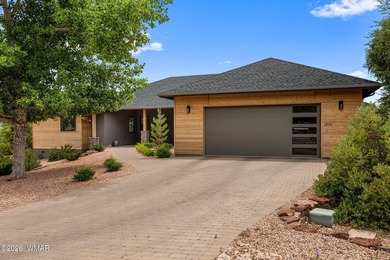 A modern masterpiece in the heart of Payson, this custom-built - photo 3
