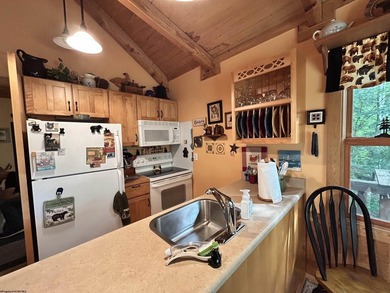 You will feel all the rustic comfort of a mountain cabin while - photo 10
