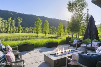 Nestled within the exclusive Snake River Sporting Club community - photo 1