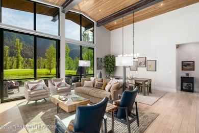 Nestled within the exclusive Snake River Sporting Club community - photo 2