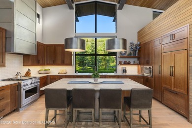 Nestled within the exclusive Snake River Sporting Club community - photo 6