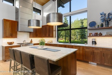 Nestled within the exclusive Snake River Sporting Club community - photo 7