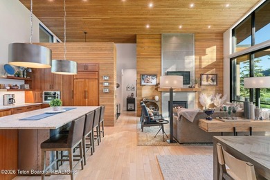 Nestled within the exclusive Snake River Sporting Club community - photo 8