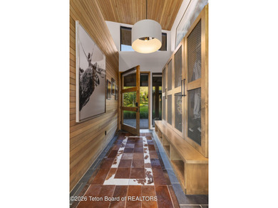 Nestled within the exclusive Snake River Sporting Club community - photo 9
