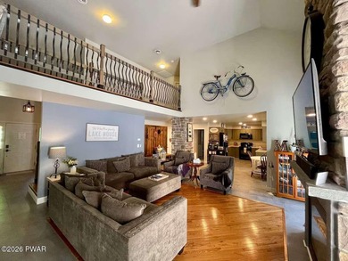 Welcome to this impressive 5,300 sq. ft. stone-front home in a - photo 3