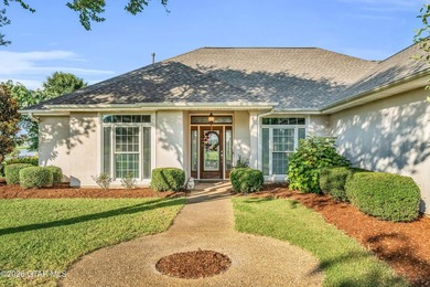 Nestled on approximately 1.5 beautifully landscaped acres in the - photo 2
