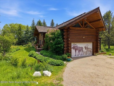 Set on three private acres along Fish Creek Road in Wilson, this - photo 2