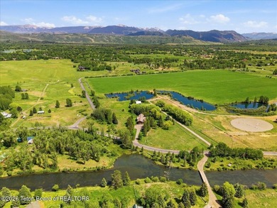 Set on three private acres along Fish Creek Road in Wilson, this - photo 5