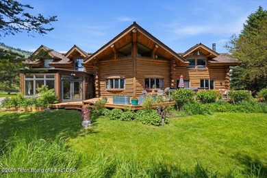Set on three private acres along Fish Creek Road in Wilson, this - photo 6