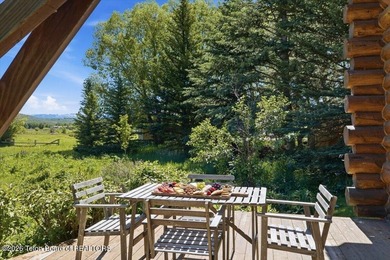 Set on three private acres along Fish Creek Road in Wilson, this - photo 9