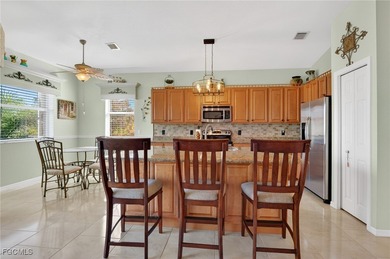 Welcome to 13960 Lake Mahogany Blvd - where peaceful lakefront