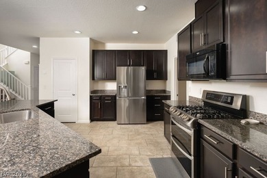 Beautifully appointed 4 bedroom, 3.5 bath home in a gated