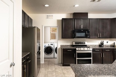 Beautifully appointed 4 bedroom, 3.5 bath home in a gated