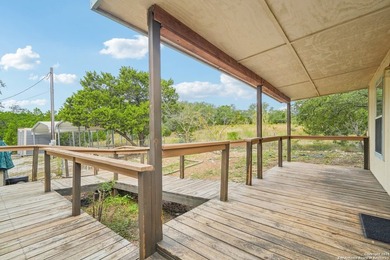 Set on over 1.3 acres in Lakehills, Texas, this 4-bedroom - photo 21